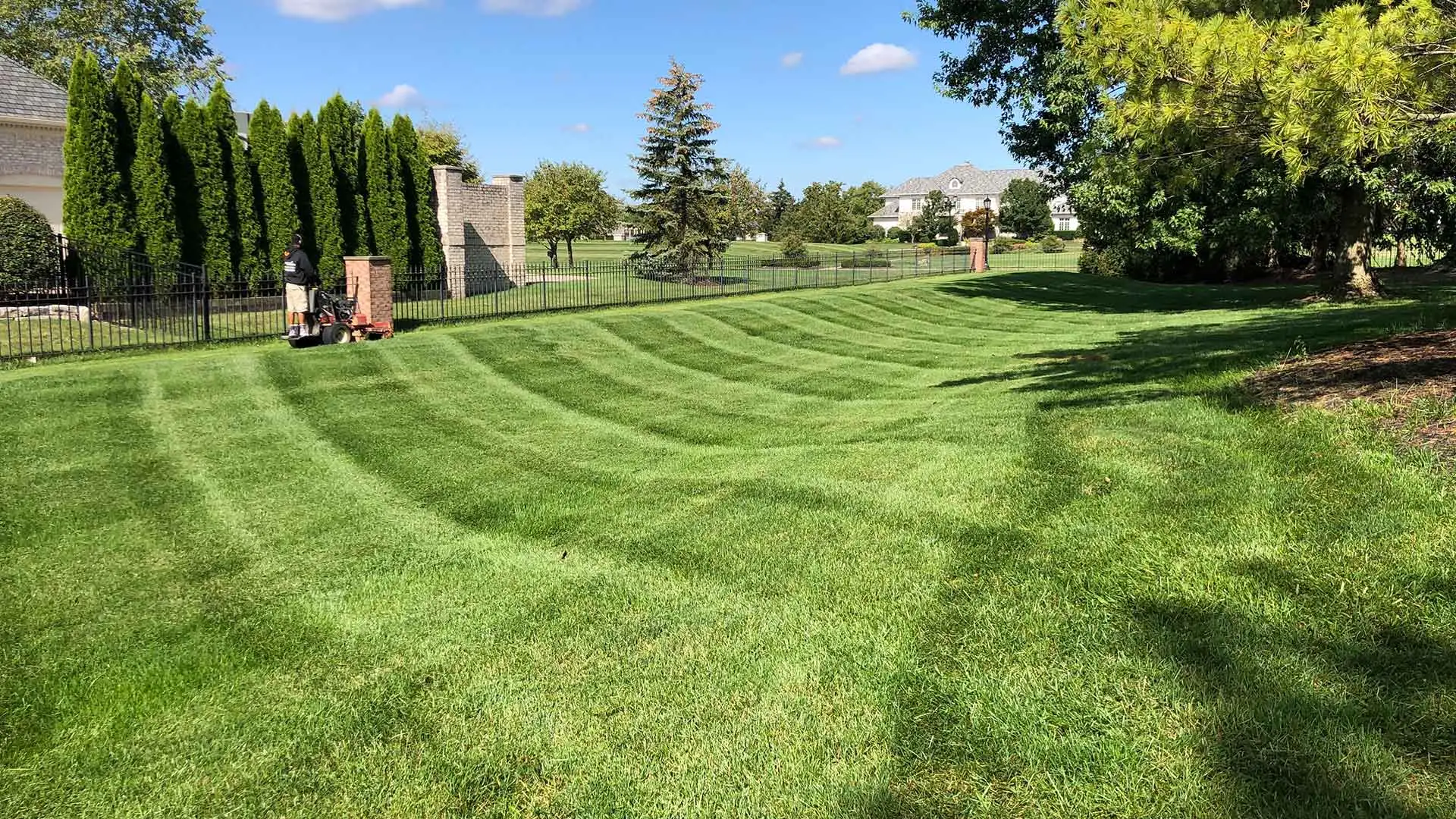 Large yard with mowing service in Carmel, IN.