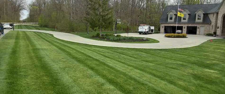 Well maintained home lawn at a property in Whitestown, Indiana.